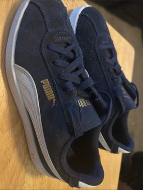 Puma Navy Suede Sneakers with White Stripe and Gold Logo